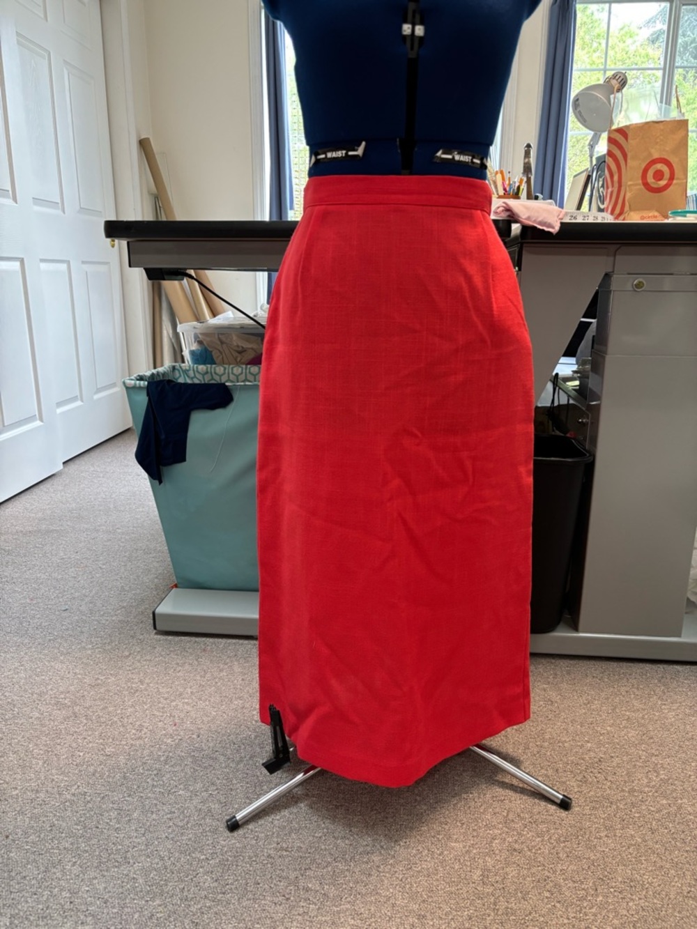 Vintage women’s linen-look skirt, size 12, red, side pockets, kick pleat.